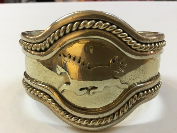 SILVER TONED CONTOURED HORSE BRACELET WITH ROPE